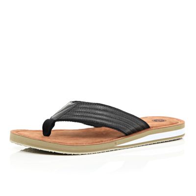 Black wedge flip flops